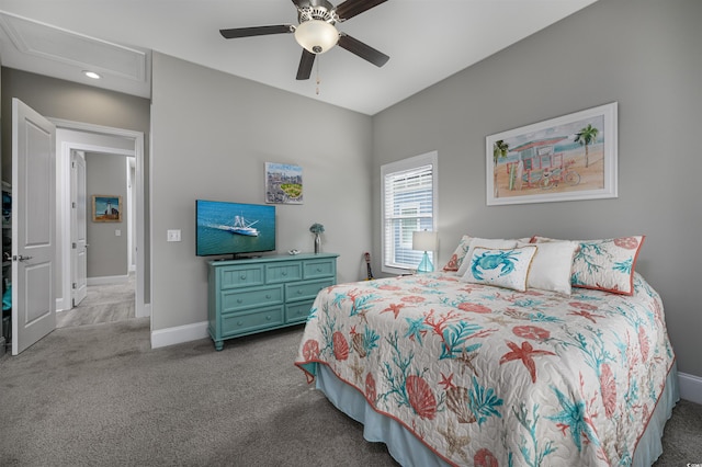 bedroom featuring carpet flooring, a ceiling fan, and baseboards