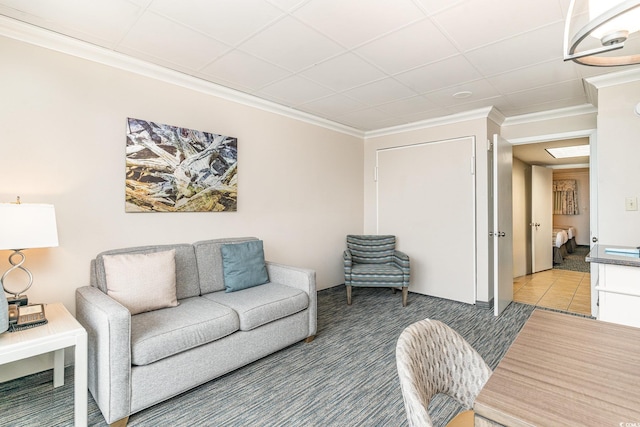 living area with ornamental molding and light colored carpet