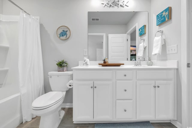 bathroom featuring toilet, shower / tub combo, a sink, visible vents, and double vanity