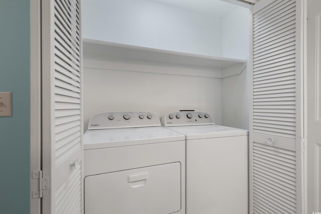 laundry area with washer and dryer and laundry area