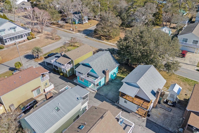 birds eye view of property with a residential view