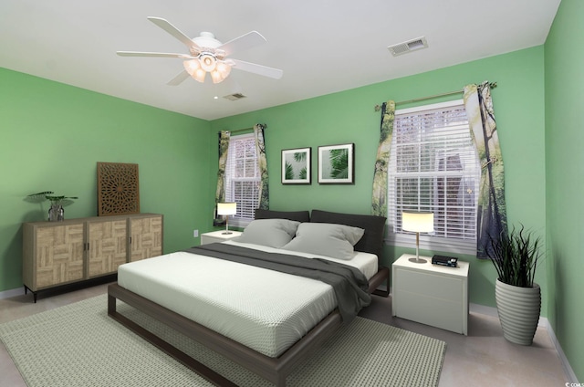 bedroom with baseboards, visible vents, and ceiling fan