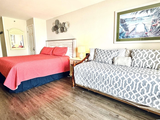 bedroom featuring wood finished floors