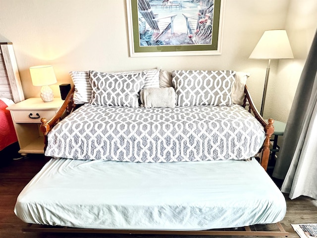 bedroom featuring wood finished floors