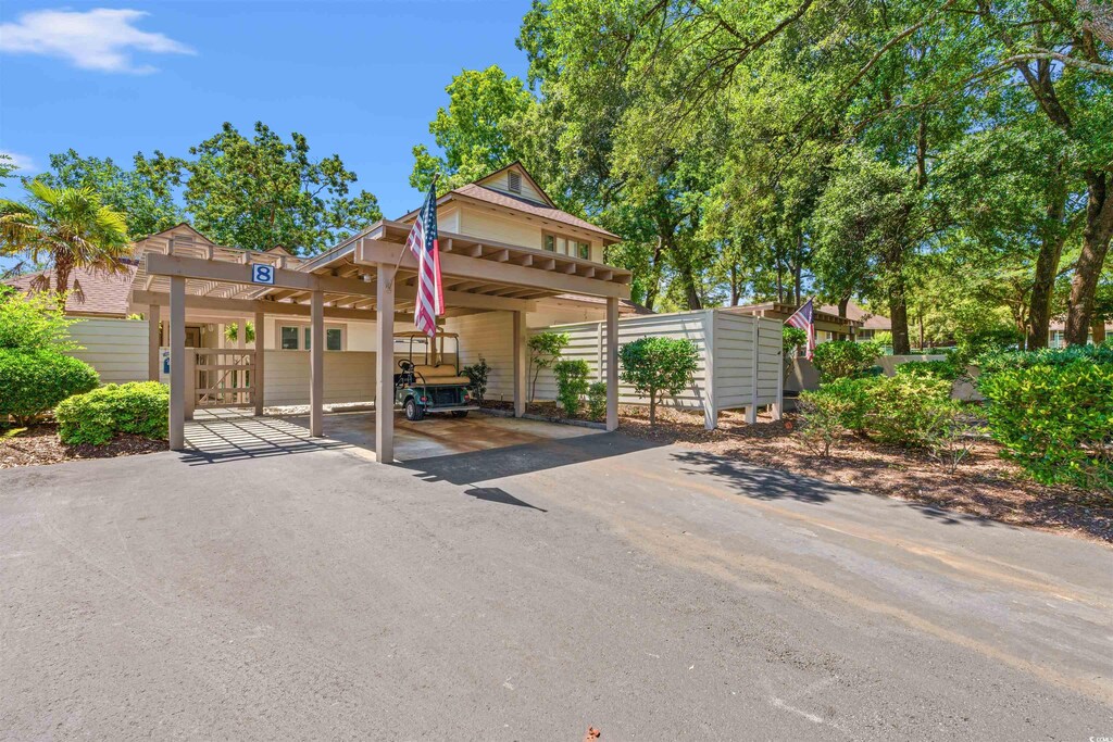 490 Ocean Creek Dr Unit 8, Myrtle Beach, SC 29572 - exterior space with aphalt driveway