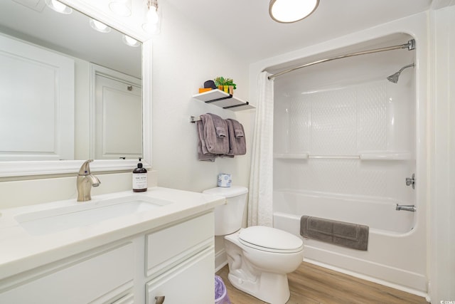 full bathroom with toilet, vanity, shower / bath combination with curtain, and wood finished floors