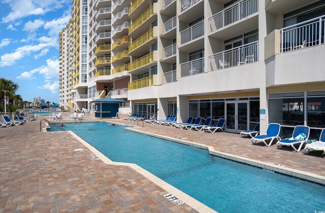 pool featuring a patio area