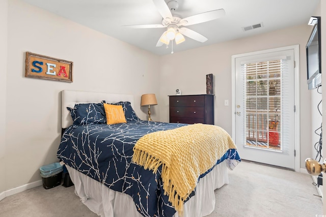 carpeted bedroom featuring access to outside, visible vents, ceiling fan, and baseboards