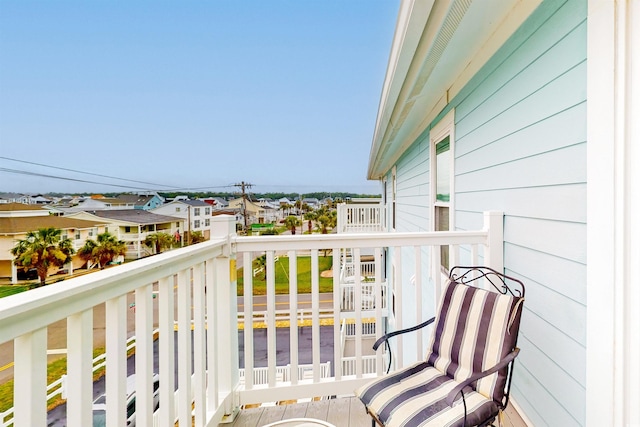 balcony featuring a residential view