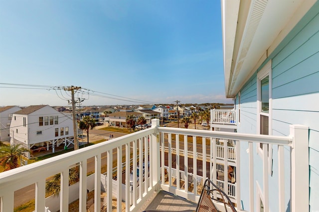 balcony featuring a residential view