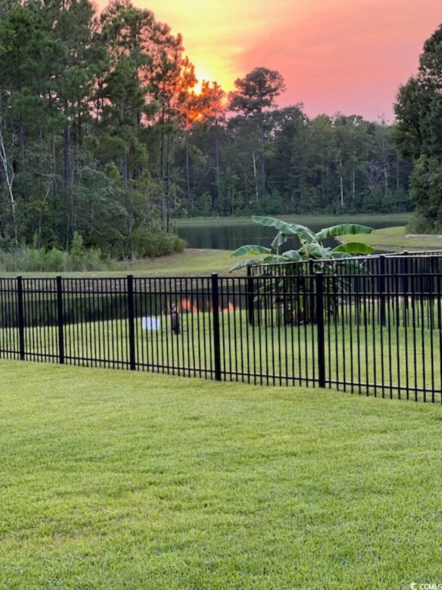 yard at dusk with fence