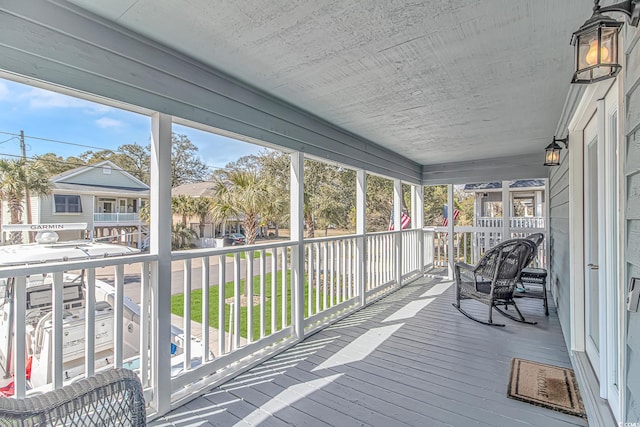 sunroom featuring a healthy amount of sunlight