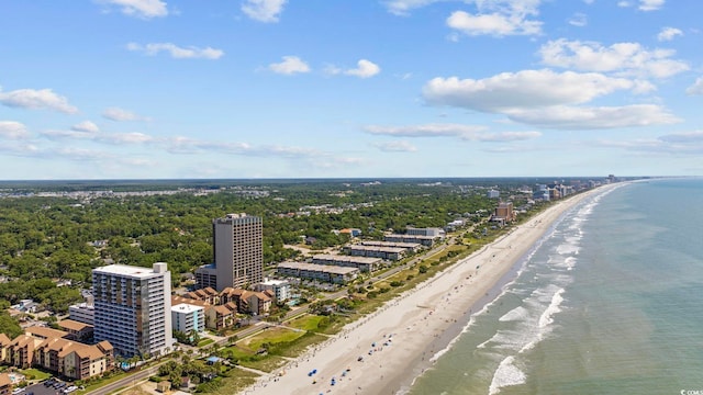 aerial view featuring a water view, a city view, and a view of the beach