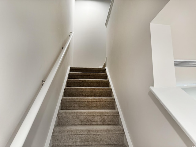 stairway with baseboards