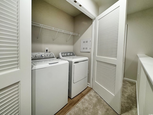 laundry area featuring laundry area, washer and clothes dryer, and baseboards