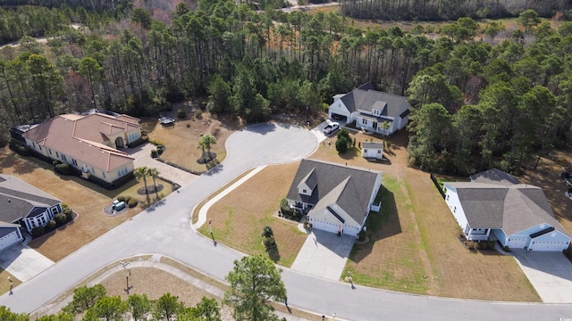 aerial view with a wooded view