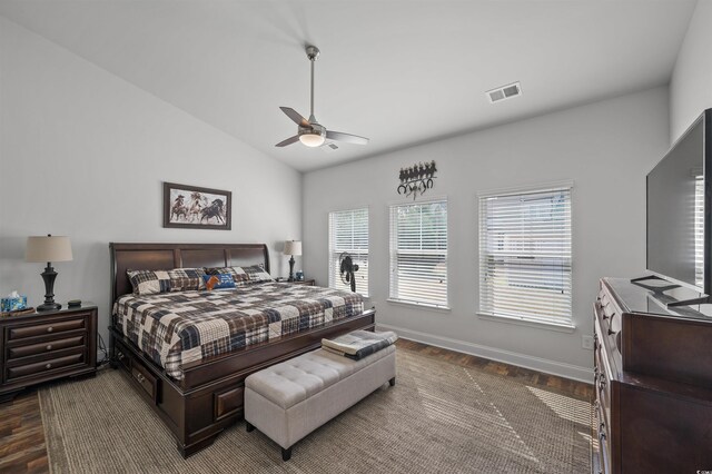 1201 Ficus Dr, Myrtle Beach, SC 29579 - bedroom with dark wood-style floors, lofted ceiling, and a ceiling fan