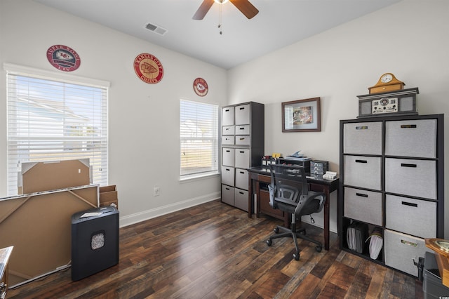 office area with visible vents, wood-type flooring, baseboards, and ceiling fan