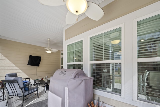 view of patio with grilling area and a ceiling fan