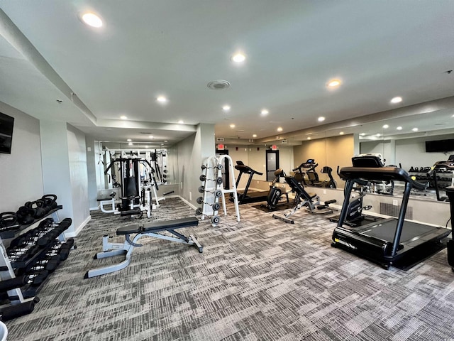 gym with carpet flooring, recessed lighting, and baseboards