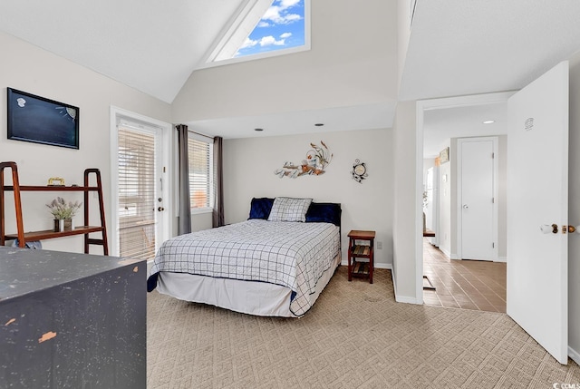 bedroom with high vaulted ceiling, light carpet, and baseboards