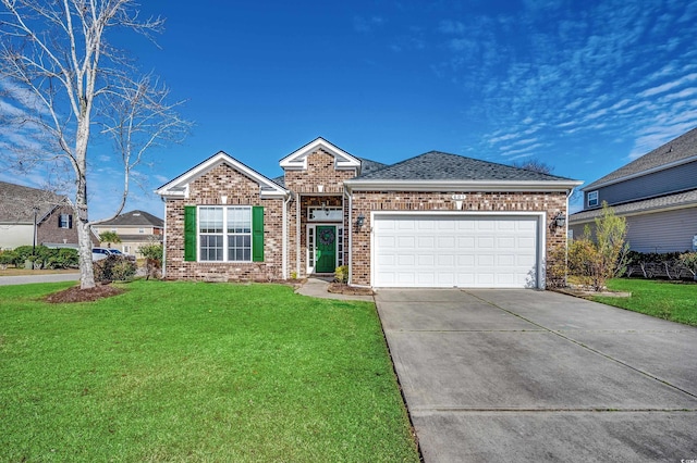 view of front facade with concrete driveway, roof with shingles, an attached garage, a front lawn, and brick siding