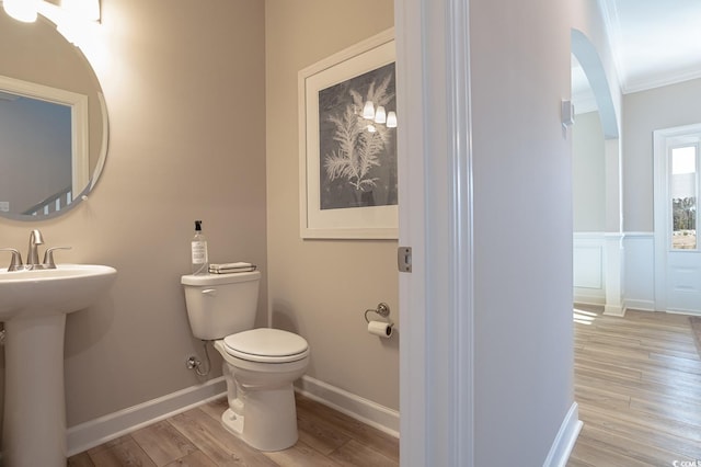 4035 Bucolic Loop, Myrtle Beach, SC 29588 - bathroom with toilet, wood finished floors, crown molding, and a sink