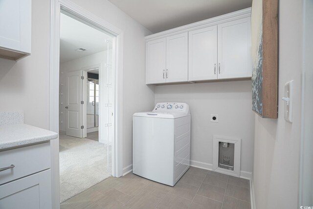 4035 Bucolic Loop, Myrtle Beach, SC 29588 - laundry area with washer / dryer, cabinet space, baseboards, and light colored carpet