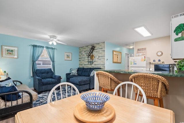 6001-1222 S Kings Hwy, Myrtle Beach, SC 29575 - dining area with an accent wall and a ceiling fan