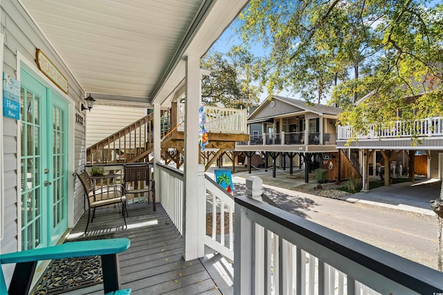 6001-1222 S Kings Hwy, Myrtle Beach, SC 29575 - wooden terrace with french doors and stairs