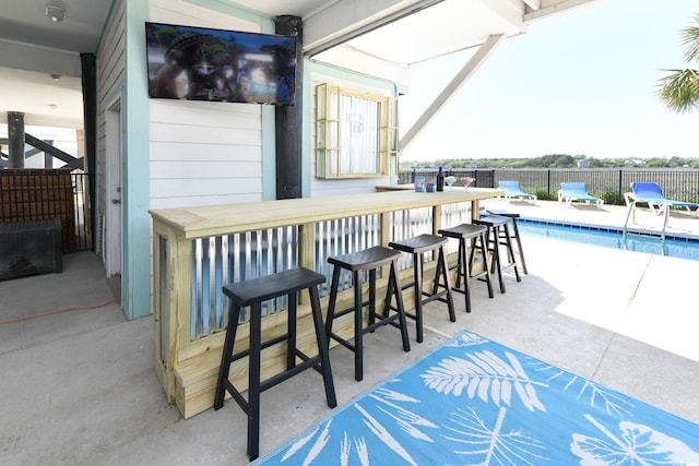 225-B Dogwood Dr N, Murrells Inlet, SC 29576 - view of patio / terrace with fence, a fenced in pool, and outdoor dry bar