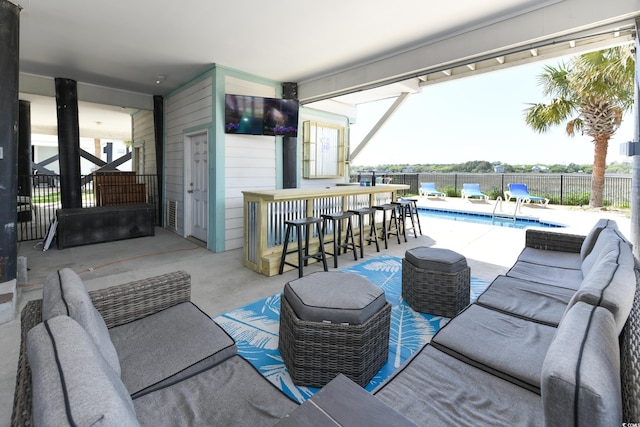 225-B Dogwood Dr N, Murrells Inlet, SC 29576 - view of patio with a fenced in pool, an outdoor hangout area, outdoor dry bar, and fence