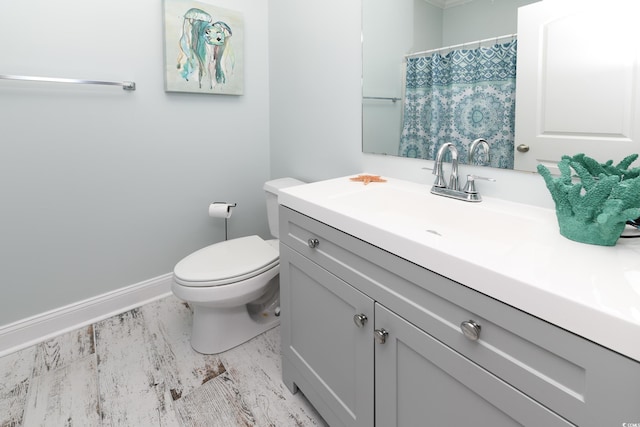 225-B Dogwood Dr N, Murrells Inlet, SC 29576 - bathroom featuring vanity, a shower with shower curtain, toilet, and baseboards
