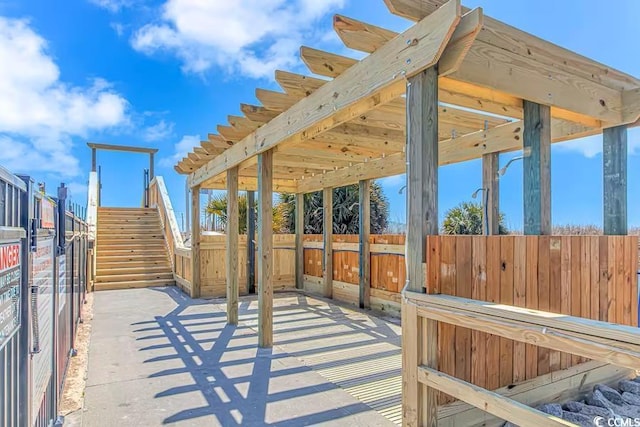 view of patio / terrace featuring fence