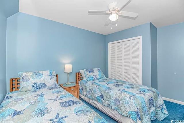 bedroom with carpet, a closet, ceiling fan, and baseboards