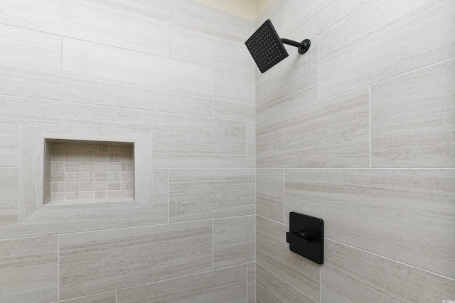 details with a tile shower