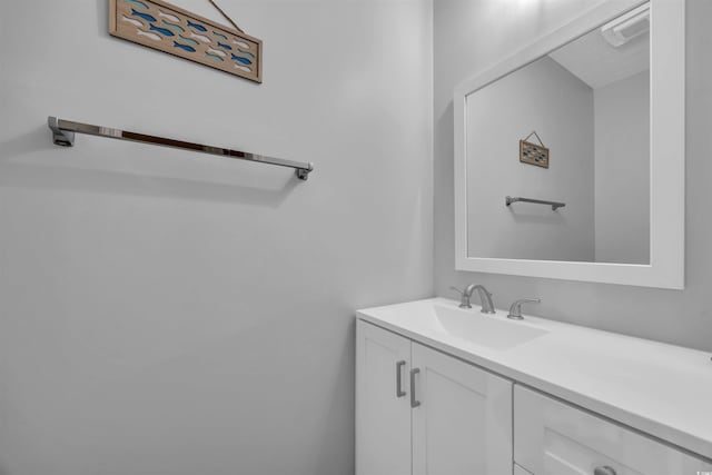 bathroom featuring visible vents and vanity