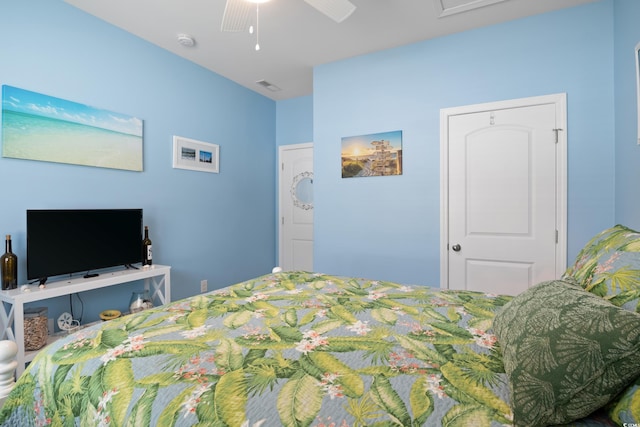 bedroom featuring visible vents and a ceiling fan