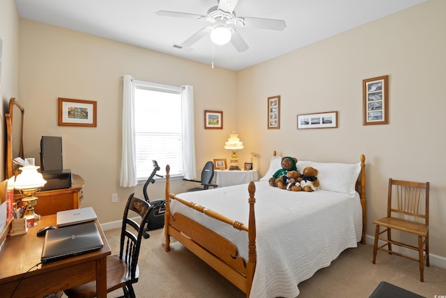 carpeted bedroom with baseboards, visible vents, and ceiling fan