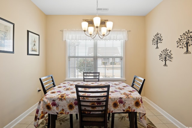 dining room featuring visible vents, baseboards, an inviting chandelier, and light tile patterned flooring