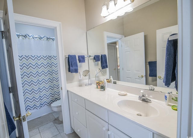 full bath featuring tile patterned flooring, curtained shower, vanity, and toilet