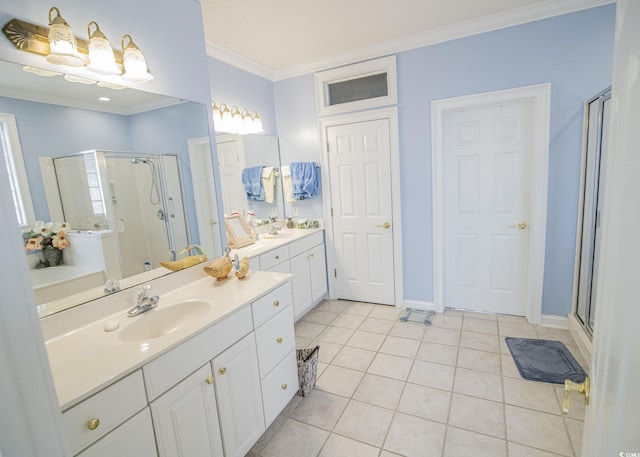 bathroom with crown molding, a stall shower, vanity, tile patterned flooring, and baseboards