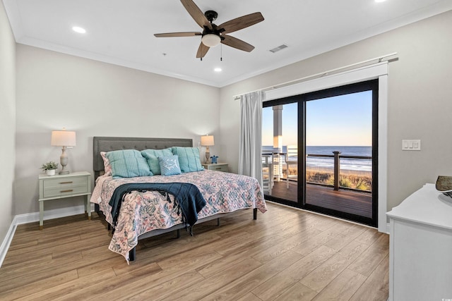 bedroom featuring crown molding, access to outside, visible vents, and light wood-style floors