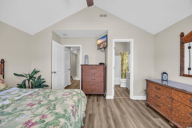 6001-MH69B S Kings Hwy, Myrtle Beach, SC 29575 - bedroom featuring light wood-style flooring, lofted ceiling, baseboards, and ensuite bathroom