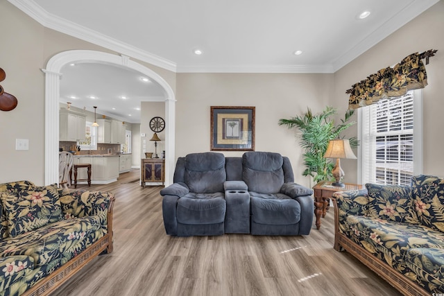 6001-MH69B S Kings Hwy, Myrtle Beach, SC 29575 - living area featuring crown molding, healthy amount of natural light, arched walkways, light wood-style flooring, and recessed lighting