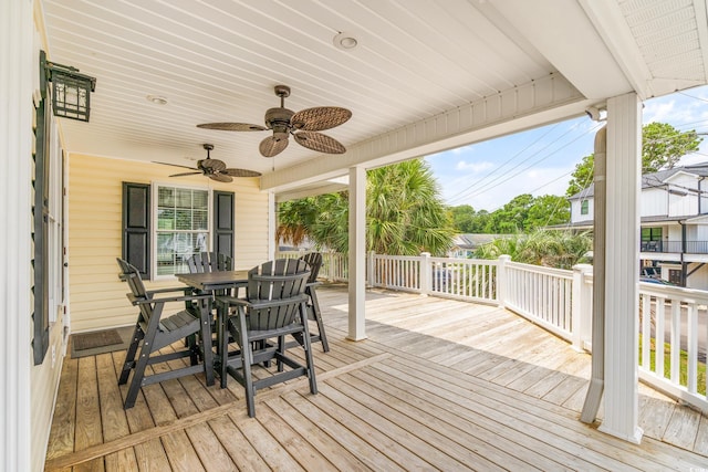 6001-MH69B S Kings Hwy, Myrtle Beach, SC 29575 - wooden deck with outdoor dining area and ceiling fan