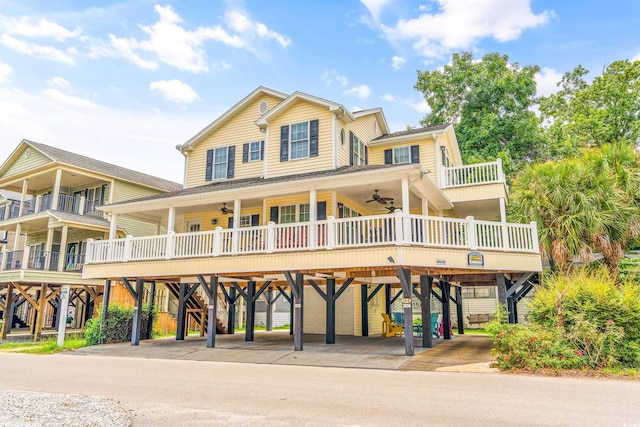 6001-MH69B S Kings Hwy, Myrtle Beach, SC 29575 - beach home featuring a ceiling fan, covered porch, and a carport