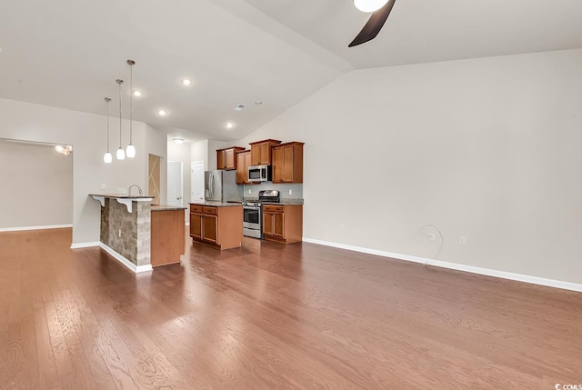 living room with high vaulted ceiling, dark wood-style flooring, ceiling fan, and baseboards