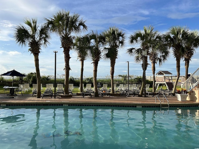 pool featuring a patio area