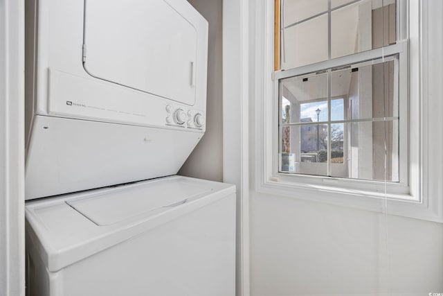 4430 Eastport Blvd Unit L5, Little River, SC 29566 - laundry room featuring stacked washing maching and dryer and laundry area